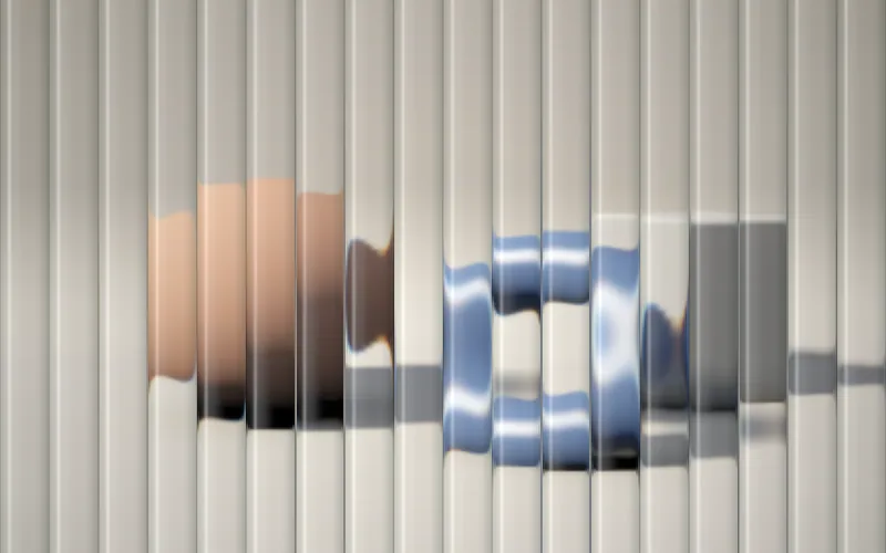 Fluted Glass shader preview: Reeded glass over an image, each rib its own little lens.