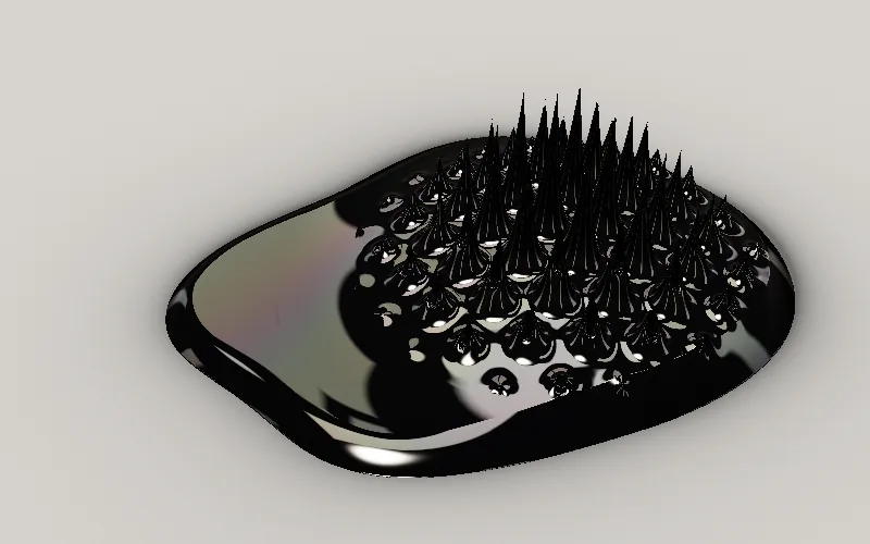Ferrofluid shader preview: A glossy pool of magnetic fluid that bristles into spikes under the pointer.